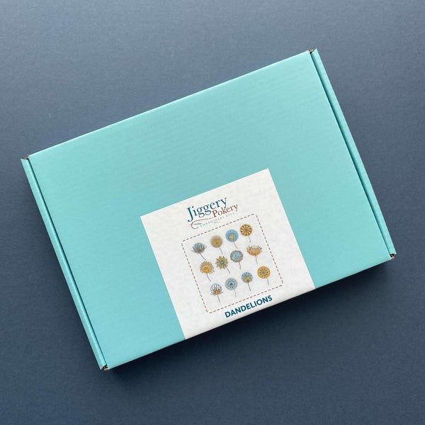 Dandelions embroidery kit packaged in a pretty turquoise blue box with labelling