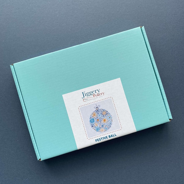 Simple Christmas embroidery kit packaged in a pretty turquoise blue box with labelling