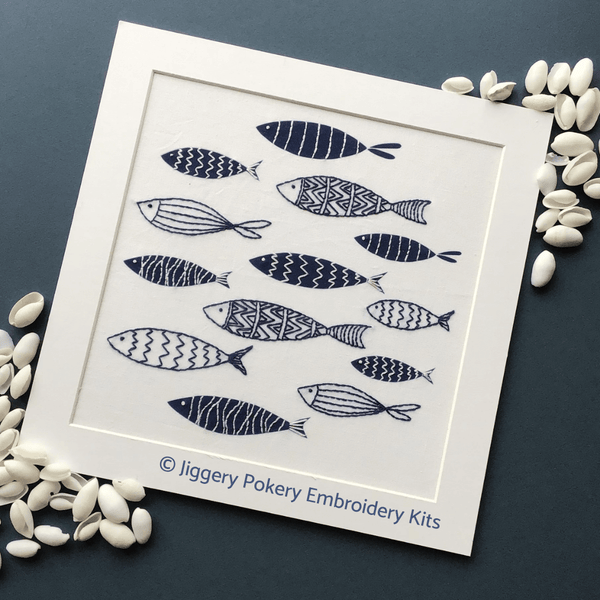 Blue fish embroidery pattern by Jiggery Pokery mounted with shells