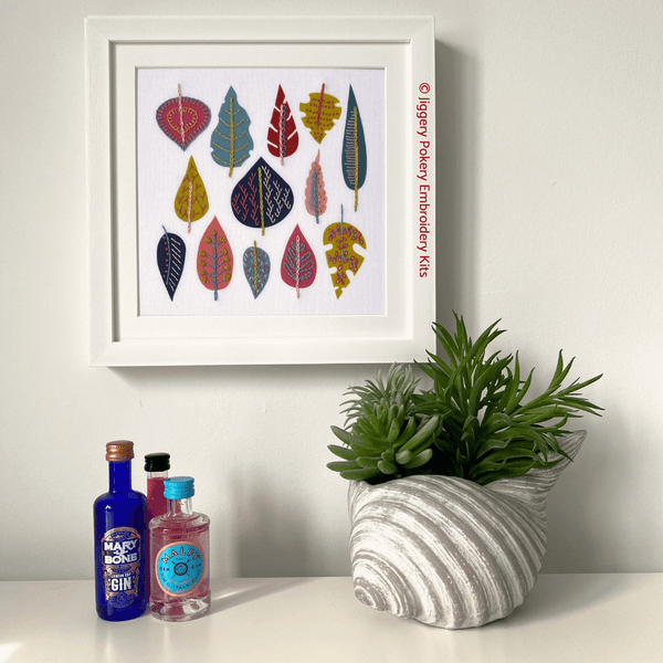 Leaf embroidery kit by Jiggery Pokery framed hanging on wall