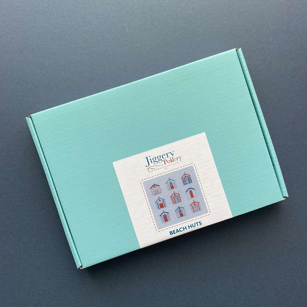 Beach embroidery kit packaged in a pretty turquoise blue box with labelling
