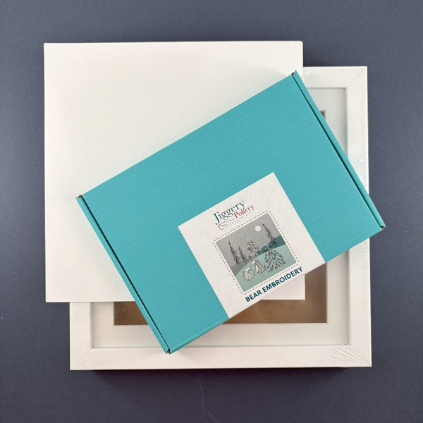 Bears embroidery kit with square white frame and a piece of mountboard cut to size
