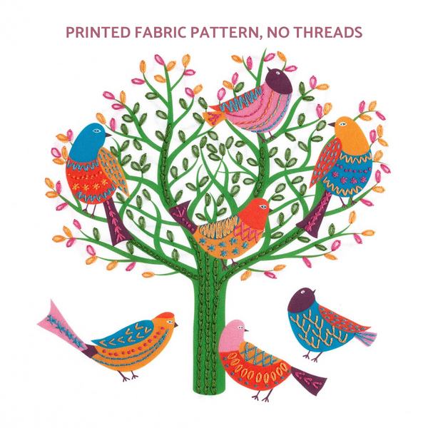 Birds embroidery pattern shows 7 colourful birds perched in a tree. The  tree is embroidered with green leaves which burst into colour around the edges.