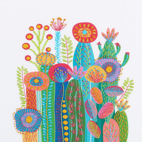 Cactus embroidery kit on a white background showing a cluster of brightly coloured cactuses and flowers in maximalist style