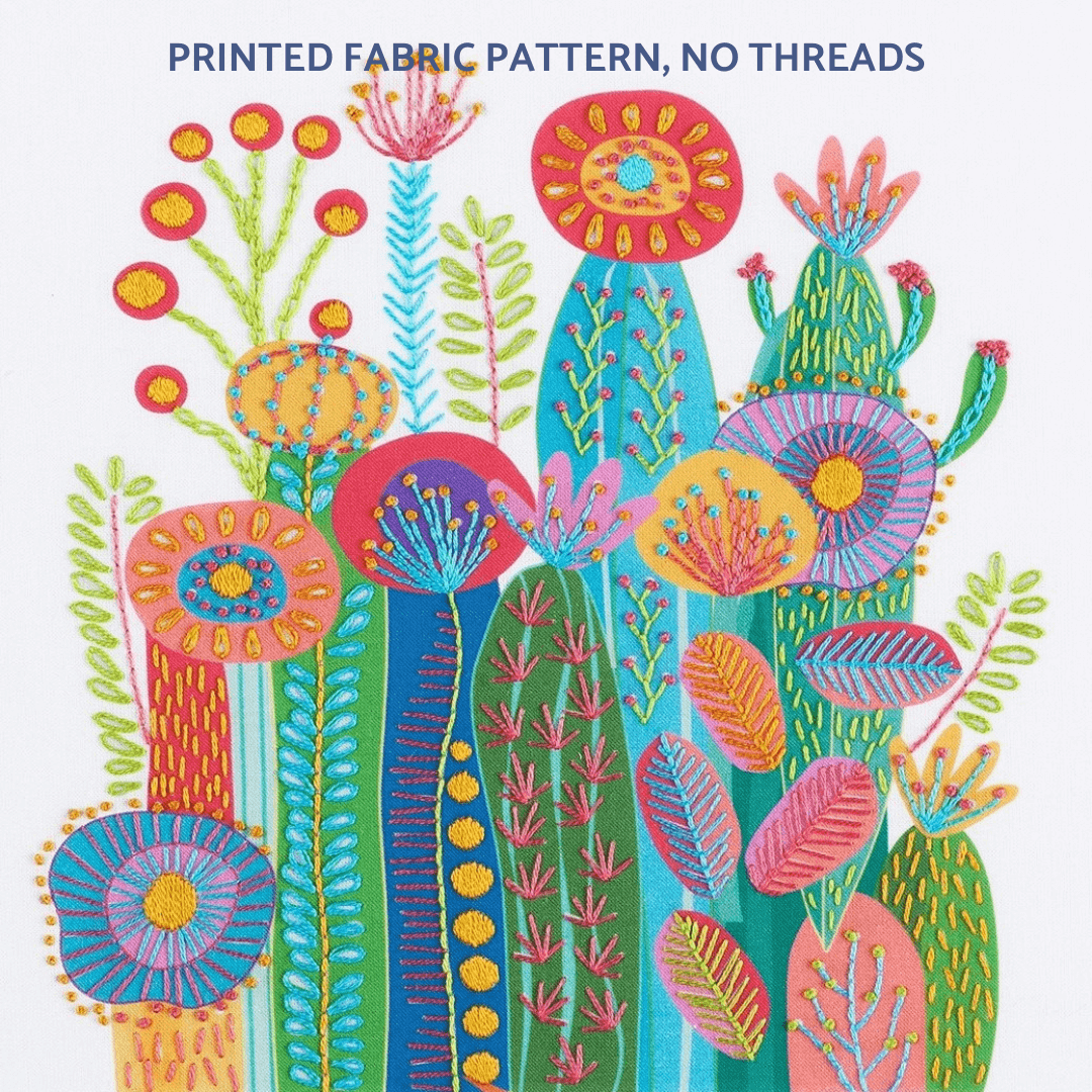 Cactus embroidery pattern shown on white fabric background. It creates a colourful burst of fun cactus flowers in abstract style