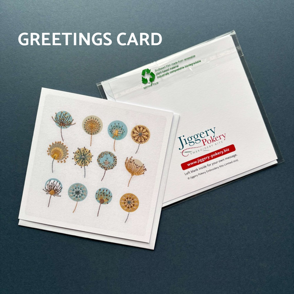 A printed greetings card featuring the dandelions embroidery design by Jiggery Pokery. Also shows the back of the card and envelope.