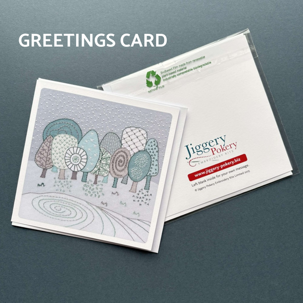 A printed greetings card featuring the winter embroidery design by Jiggery Pokery. Also shows the back of the card and envelope.