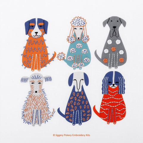 Dogs embroidery kit showing 6 grey, orange and blue dogs embroidered with simple embroidery stitches