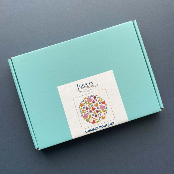 Easy flower embroidery kit in a pretty turquoise blue box with labelling