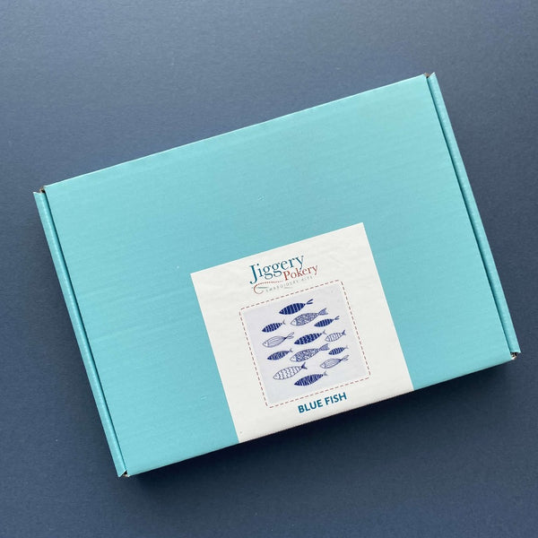 Fish embroidery kit packaged in a pretty turquoise blue box with labelling