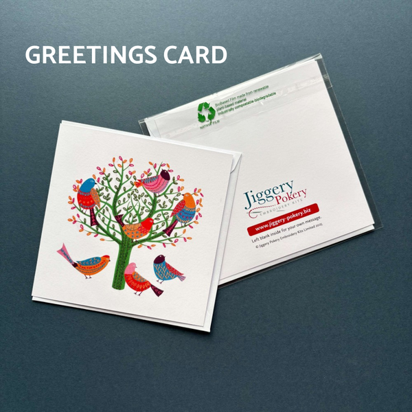 A printed greetings card featuring the birds and tree embroidery design by Jiggery Pokery. Also shows the back of the card and envelope.