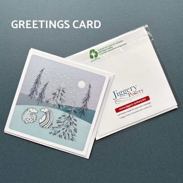 A printed greetings card featuring the polar bears embroidery design by Jiggery Pokery. Also shows the back of the card and envelope.