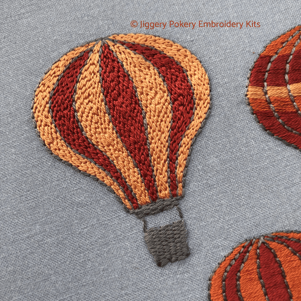 Hot air balloons embroidery kit close-up of balloon stitched with brick stitch