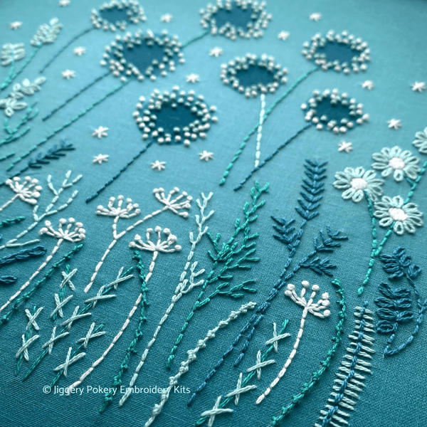 Close-up of the grasses and stems in the modern embroidery flowers kit.