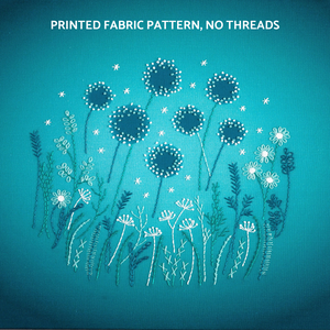 The modern embroidery flowers pattern creates a moonlit garden of flowers and grasses sprinkled with stars stitched in pale green, green, dark blue and white DMC threads (not supplied)