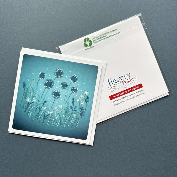 A printed greetings card featuring the modern flowers  embroidery design by Jiggery Pokery. Also shows the back of the card and envelope.