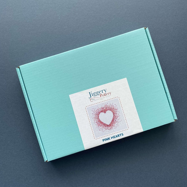 Pink hearts embroidery kit packaged in a pretty turquoise blue box with labelling