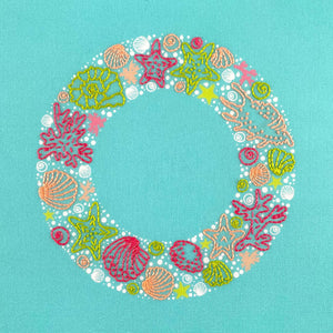 Seaside embroidery wreath of sea shells, star fish, seaweed and bubbles in bright pink, green and coral colours