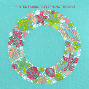 The wreath embroidery pattern creates a wreath of seashells, seaweed and stars with easy embroidery stitches in green, pink and coral