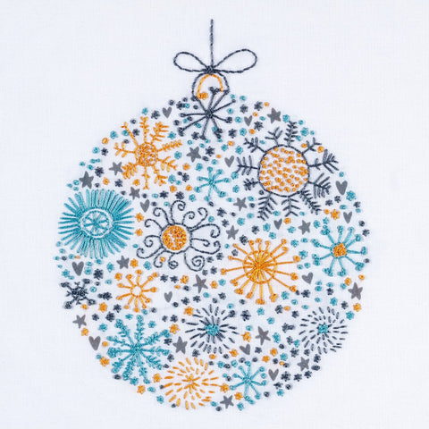 The Scandinavian Christmas embroidery design shows a festive bauble stitched in dark grey, teal and orange gold DMC thread colours colours