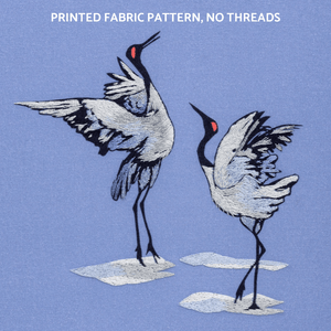 Using the technique of thread painting, this embroidery pattern creates two dancing crane birds in Japanese style