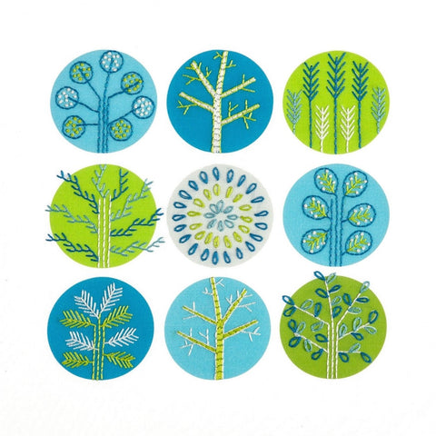 Trees embroidery kit creates Scandinavian style tree shapes in cool blue, green, turquoise and grey