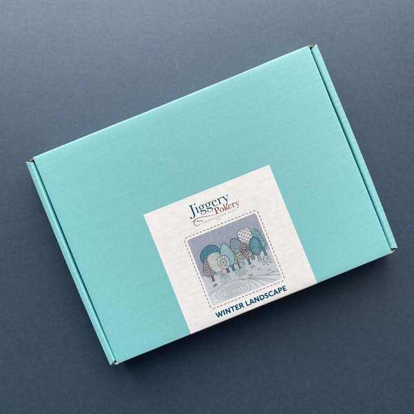 Winter embroidery kit packaged in a pretty turquoise blue box with labelling