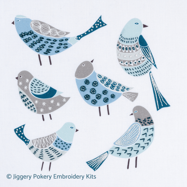 Birds embroidery kit showing 6 Scandinavian style birds printed in blue, pale green and brown