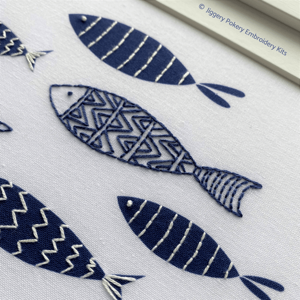 Jiggery Pokery blue fish embroidery pattern close-up