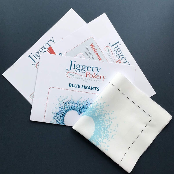Jiggery Pokery blue hearts embroidery pattern printed onto fabric, shown with instructions