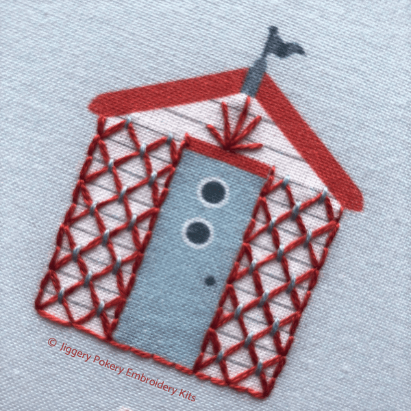 Close up of one beach hut in Jiggery Pokery embroidery kit
