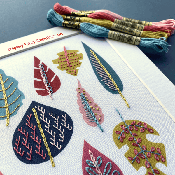 Close-up of leaf embroidery kit with DMC threads