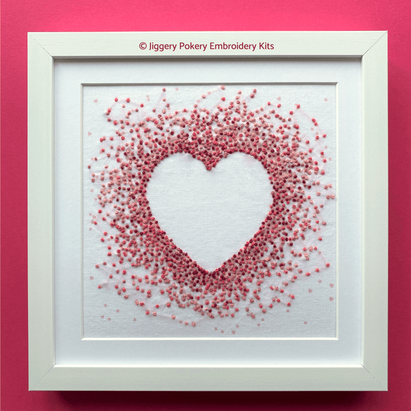 Framed pink hearts embroidery pattern on pink background